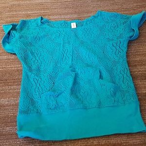 A top that is good to wear over a tank top or bath